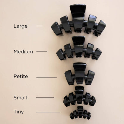 Classic Claw Clip in Jet Black shown in five sizes: Large, Medium, Petite, Small, and Tiny.