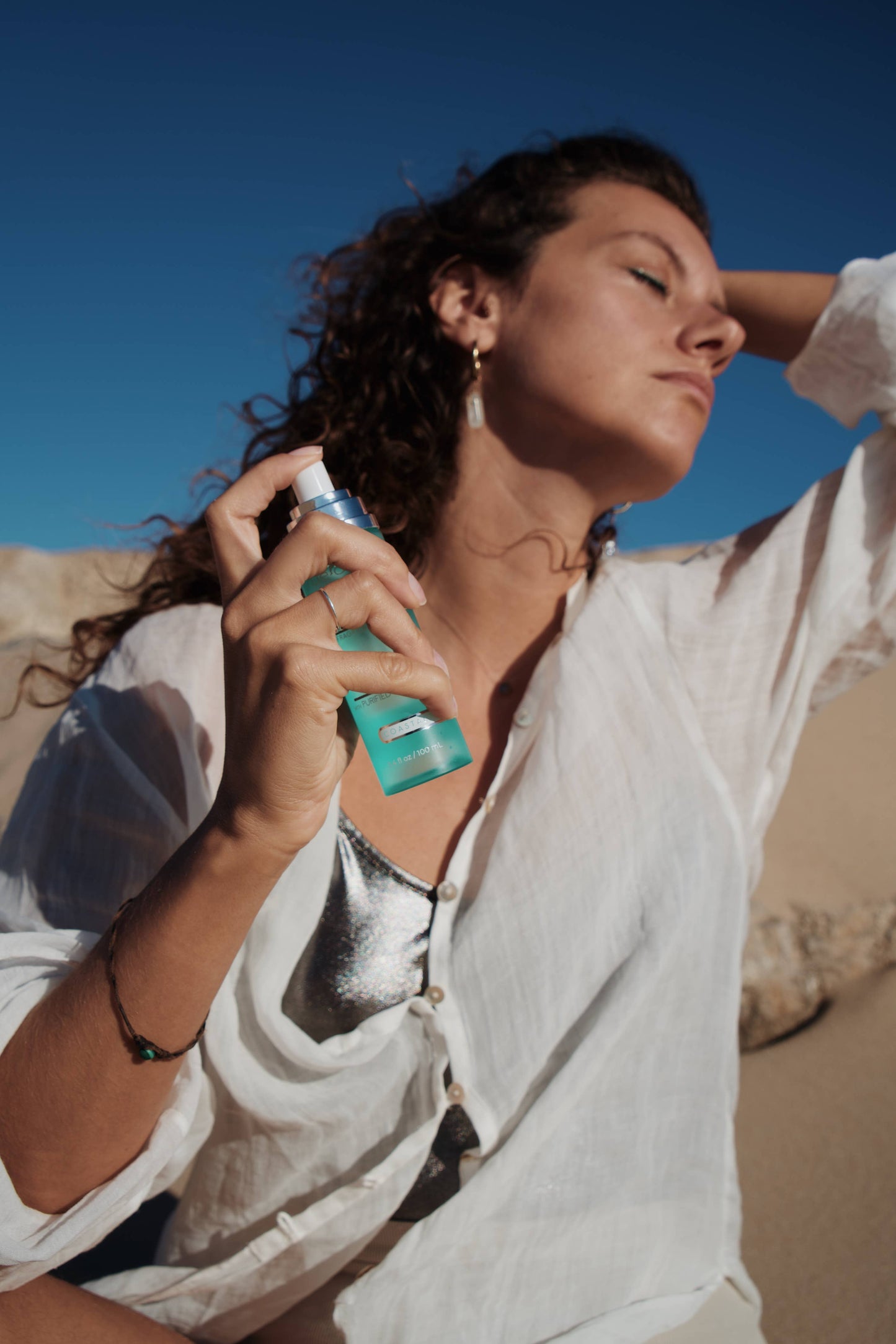 True Ocean: Body Spray—blue bottle, 3.4 oz. Available in multiple sizes.