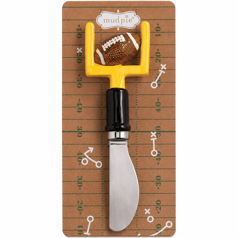 Cheese spreader with a yellow goalpost and football-shaped handle; available in 4 styles.