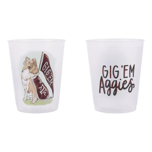 Set of two clear, frosted Texas A&M mascot cups featuring brown text and artwork—one with a dog and "Gig 'Em TAM" banner, the other with "GIG 'EM Aggies." Available in standard drinkware size.
