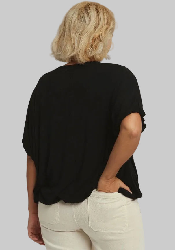 Bubble Sleeve & Hem Top in a loose, eco-friendly design. Available in sizes XS to XL.