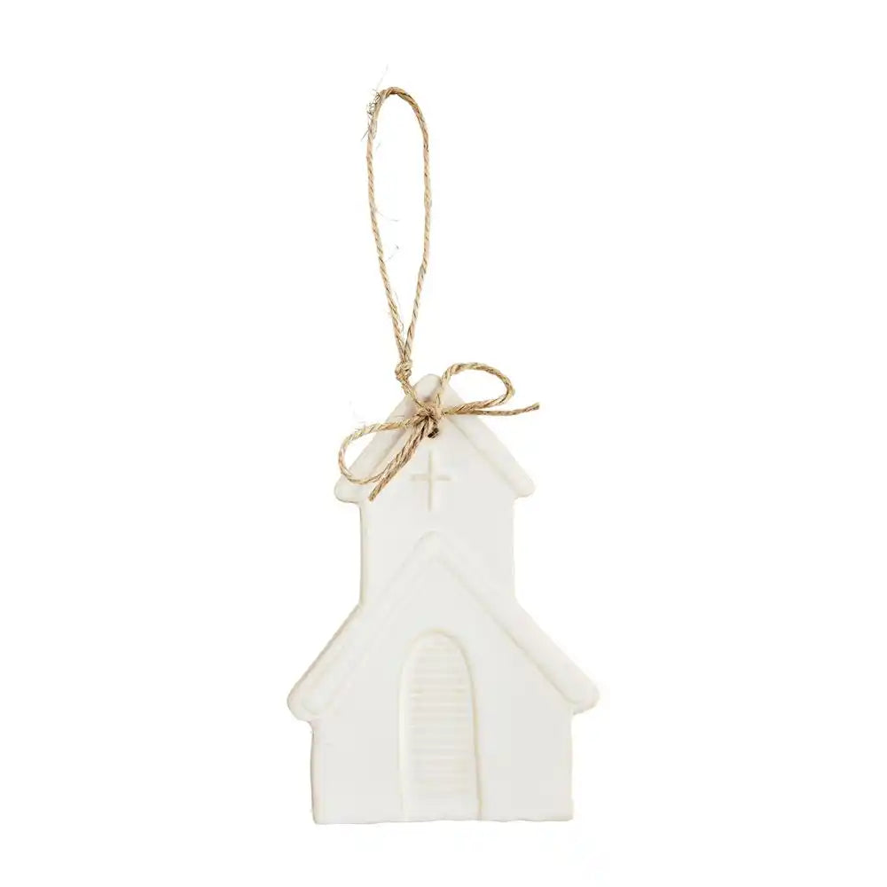 White stoneware church ornament with cross and jute hanging loop.