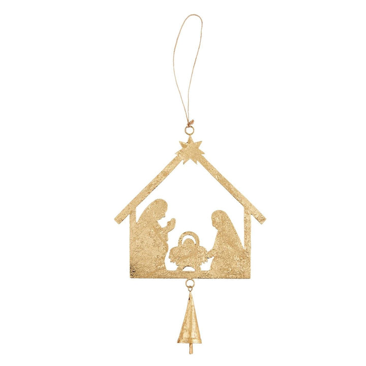 Gold-colored foiled tin nativity house ornament with hanging star and bell.