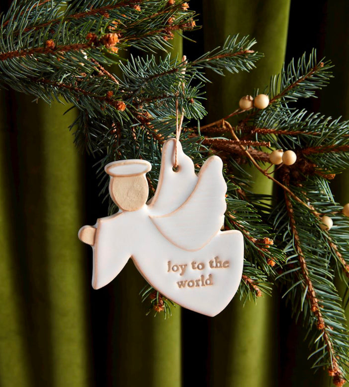 Stoneware Nativity Ornaments angel embossed with “joy to the world” on its wing. Available in various sizes.