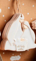 Ceramic Nativity Ornaments shaped as the Holy Family with embossed “oh holy night” text at the base.