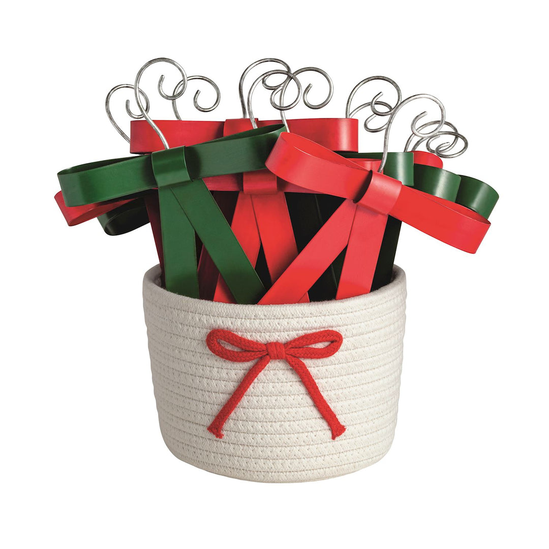 Red and green bow ornaments with hanging hooks.