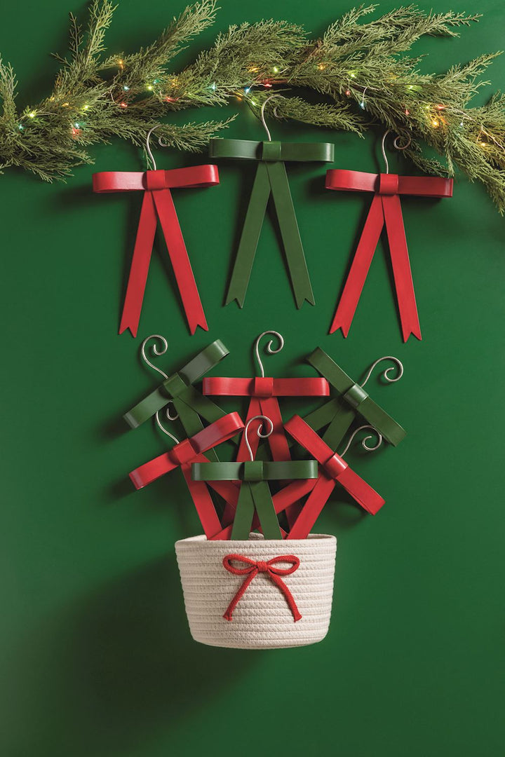 Red and green metal bow ornaments.