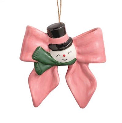 Ceramic Bow Ornament, hand-painted pink ribbon design with a smiling snowman in a black top hat and green scarf; available in 4 styles.