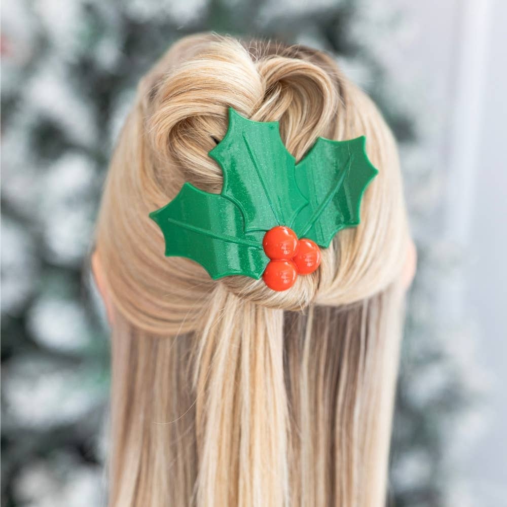 Green glitter holly leaves and three red berries flat hair clip.