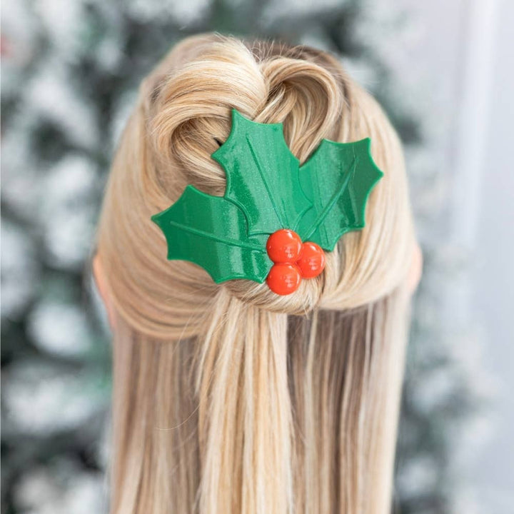 Green glitter holly leaves and three red berries flat hair clip.