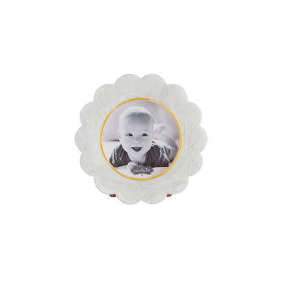 The Small Resin Frame has a scalloped circular design with a textured white finish, perfect for displaying photos. Available size: Small.