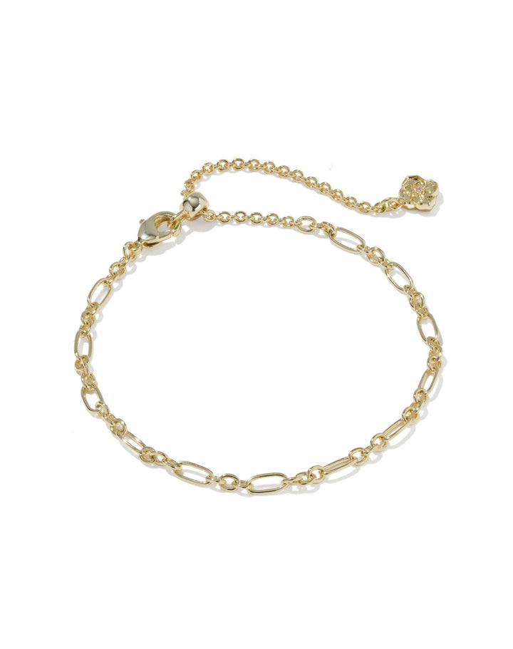The Fate Set Of 2 White CZ Bracelet includes two delicate gold chain bracelets with oval links, adjustable extensions, and small decorative charms at the ends. Sizes available: adjustable.