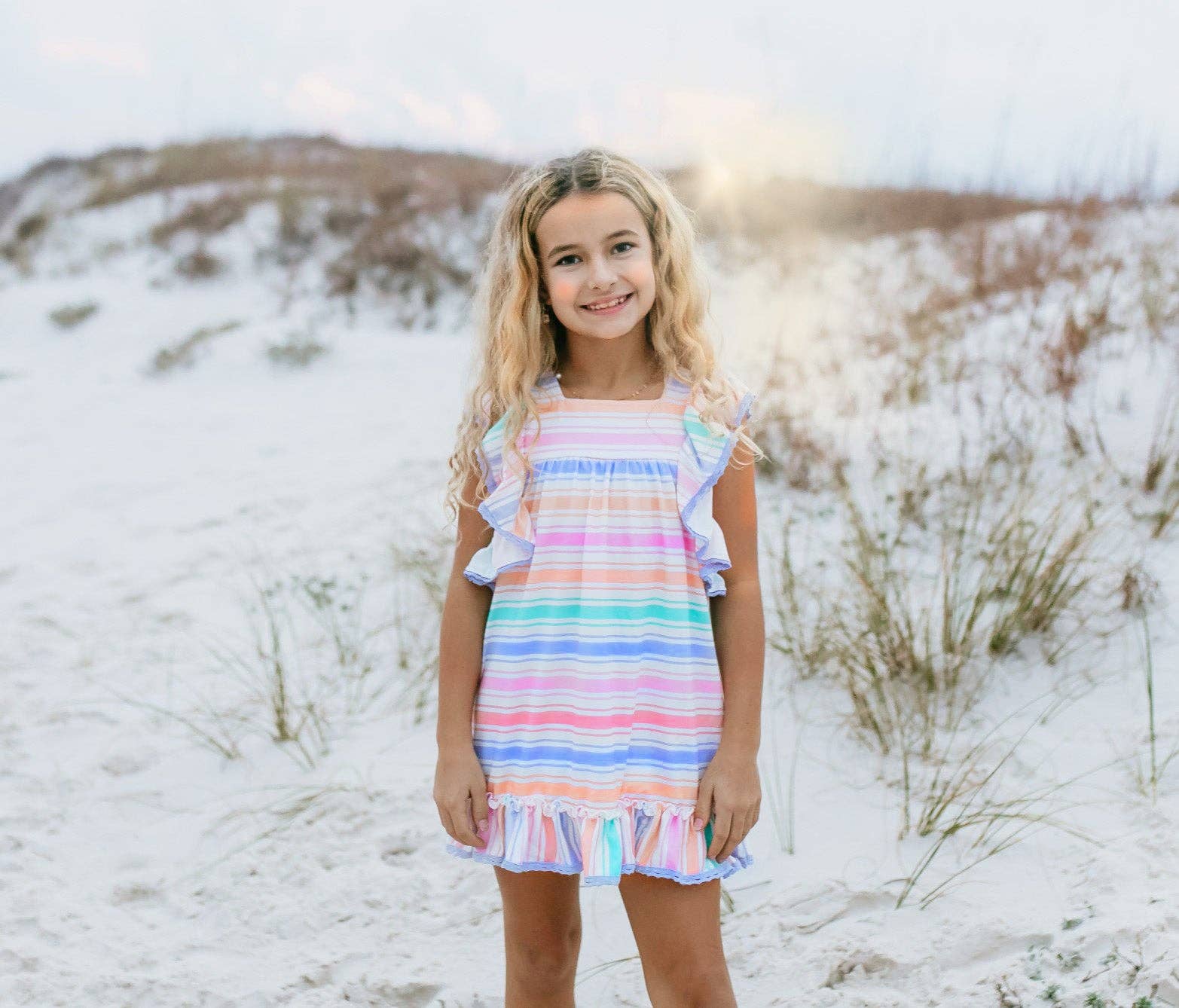 Girls Pastel Rainbow Stripe Ruffles & Lace Spring Dress, available in sizes 2T-10, featuring lace and ruffle accents.
