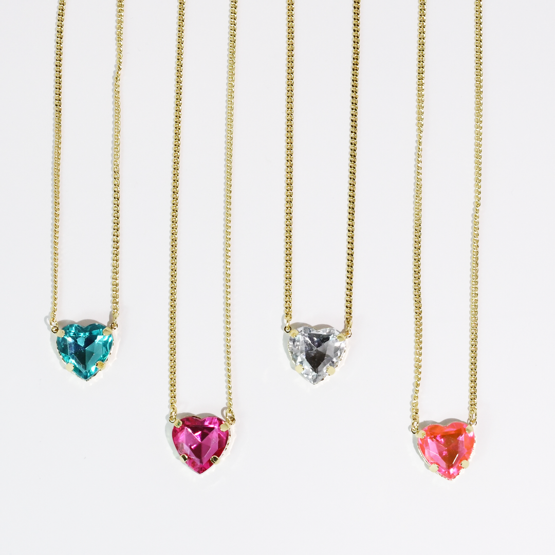 Gold necklace with dainty chain and aqua heart crystal pendant. Available sizes: 16", 18".