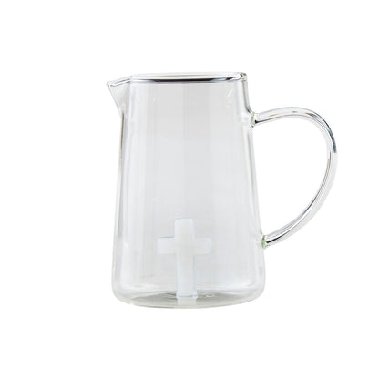 Clear glass pitcher-style vase with handle, spout, and frosted white cross design. Available in 6" and 8" sizes.