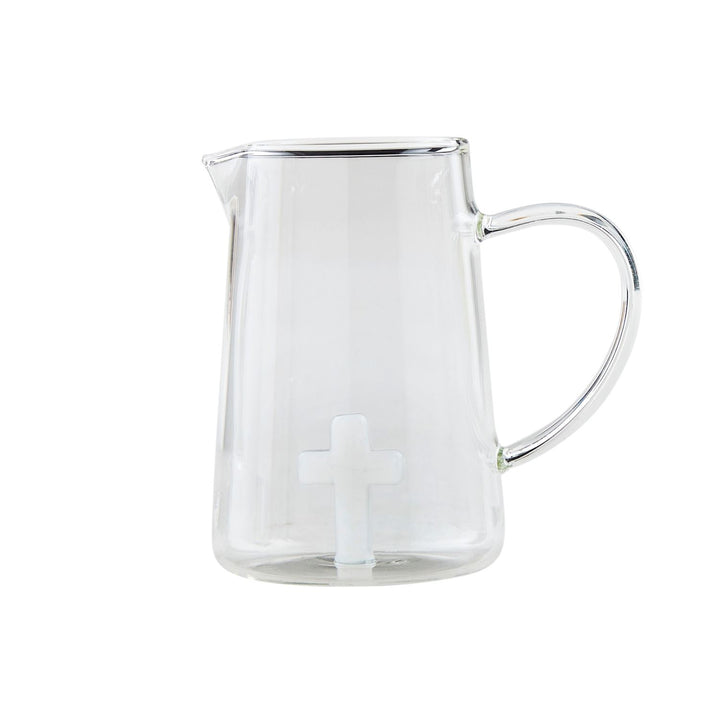 Clear glass pitcher-style vase with handle, spout, and frosted white cross design. Available in 6" and 8" sizes.
