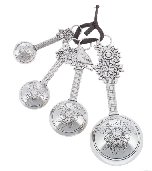 Sunflower Measuring Spoon Set of four metal spoons with floral motifs and cord.