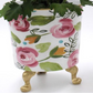 6.25-inch Floral Metal Cachepot with pink and orange flowers, gold legs. Available size: 6.25 inches.
