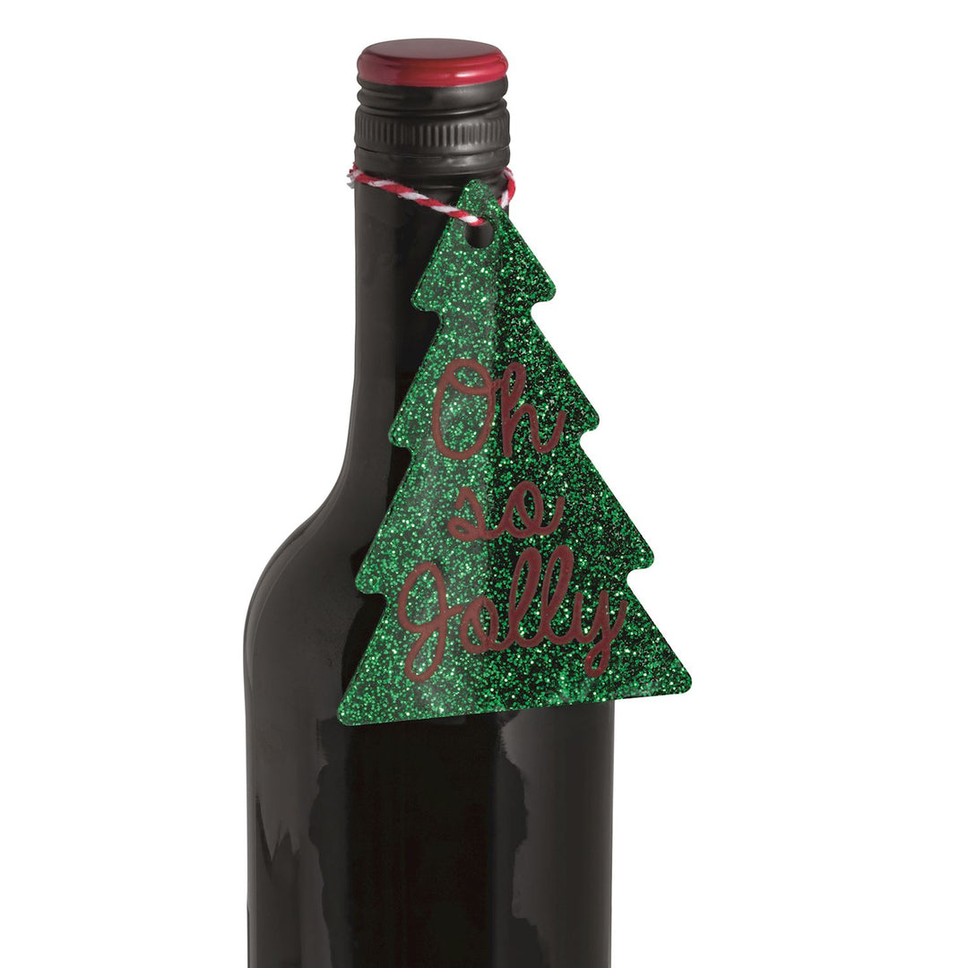 Green glittery Christmas tree-shaped gift tag from our Bow Topper &amp; Gift Tag Set, reading “Oh so Jolly.”.