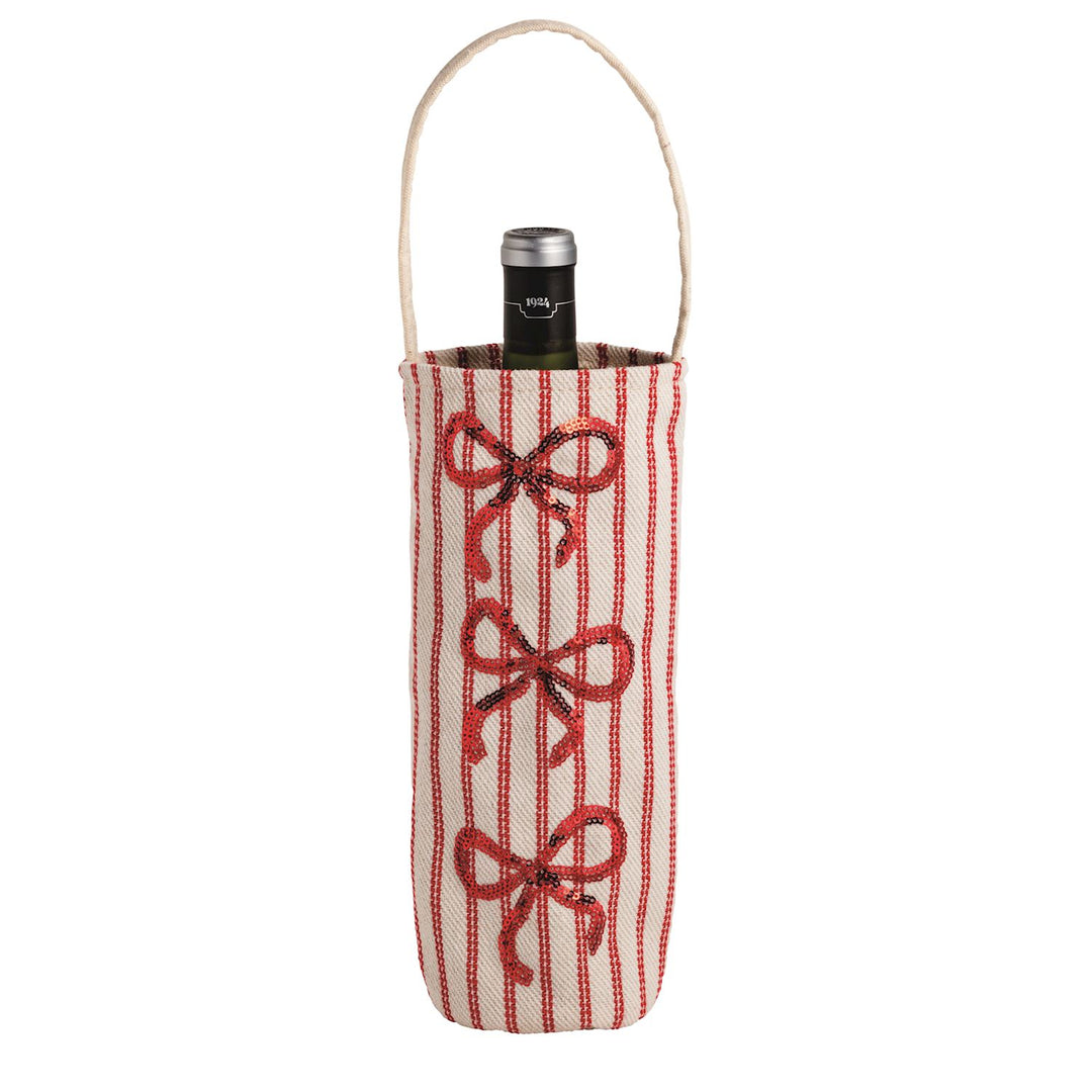 Cylindrical Holiday Sequin Wine Bag with red vertical stripes, three sequined red bows, and a rope handle.