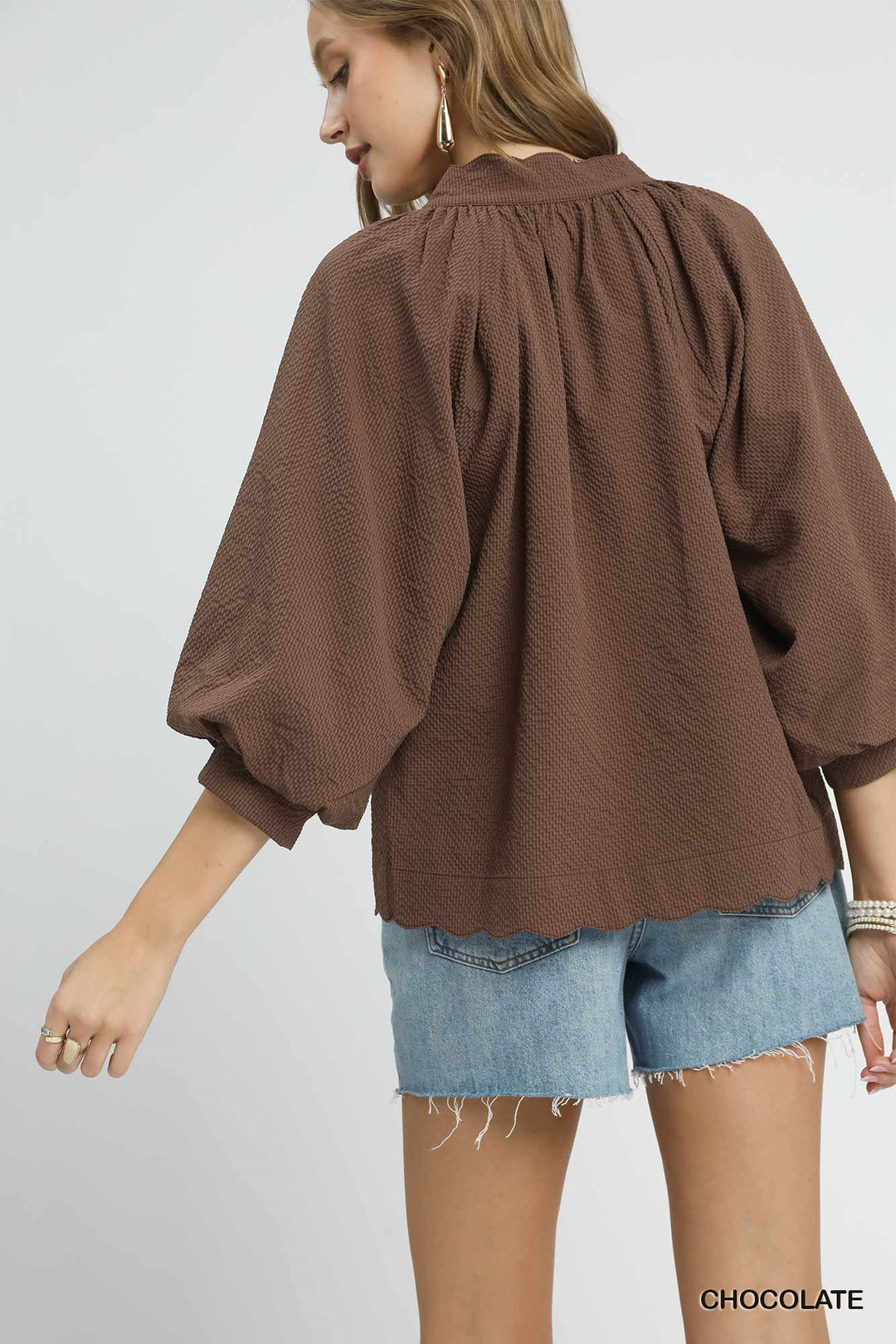 Scallop Hem Balloon Sleeve Top in textured brown; available in sizes XS-XL.