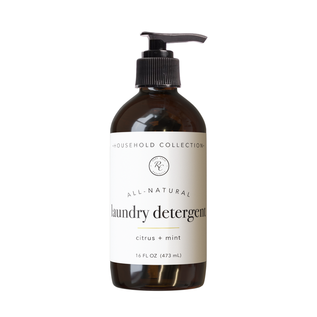 Brown bottle with black pump labeled “Laundry Detergent | Liquid | 16 oz: Bergamot + Lavender,” available in 16 oz size.