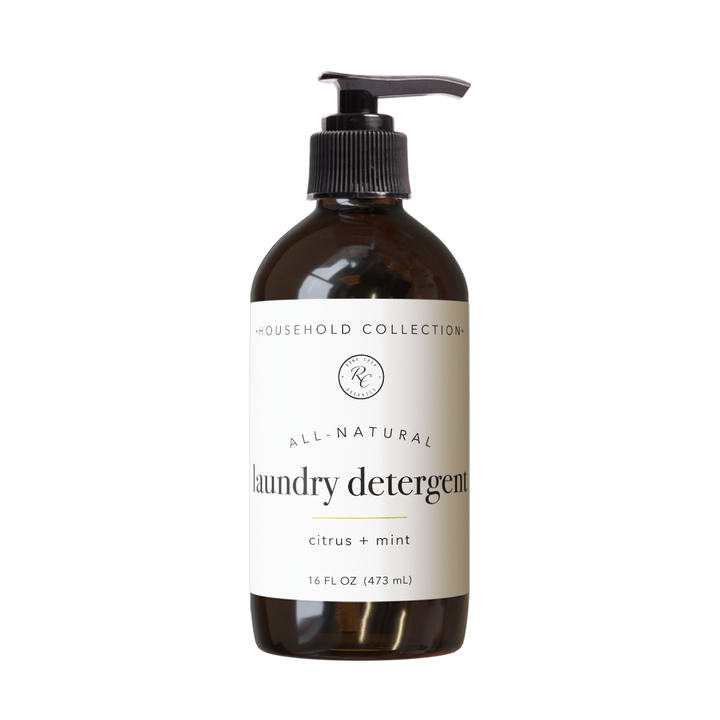 Brown bottle with black pump labeled “Laundry Detergent | Liquid | 16 oz: Bergamot + Lavender,” available in 16 oz size.