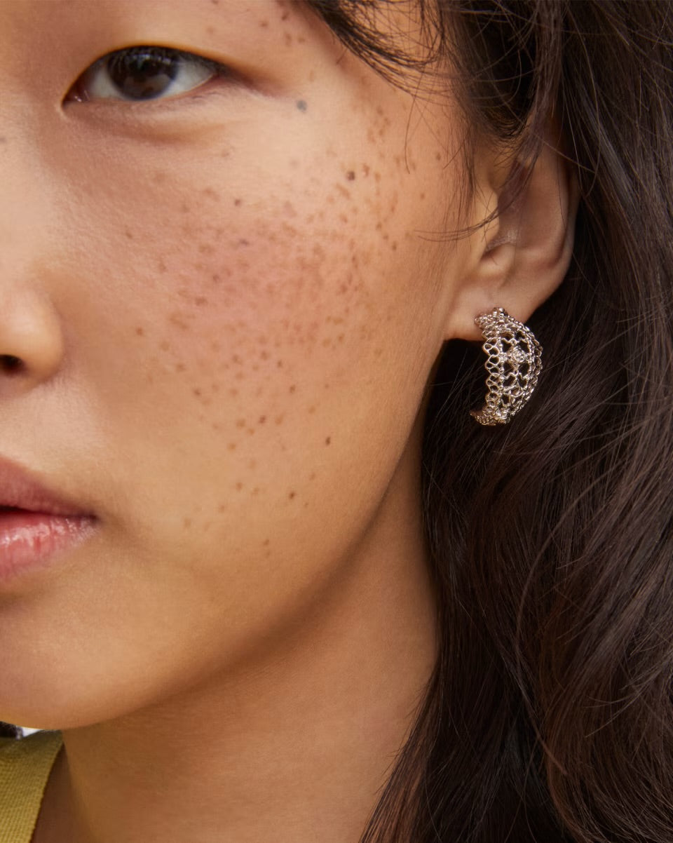 Krista Lace Gold Huggie Earring by Kendra Scott with sparkling stones, available in small, medium, and large sizes.