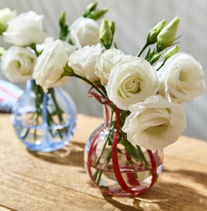 Two small Ruffled Ribbon Vases, one with a red ribbon and one with a blue ribbon. Available in small size.
