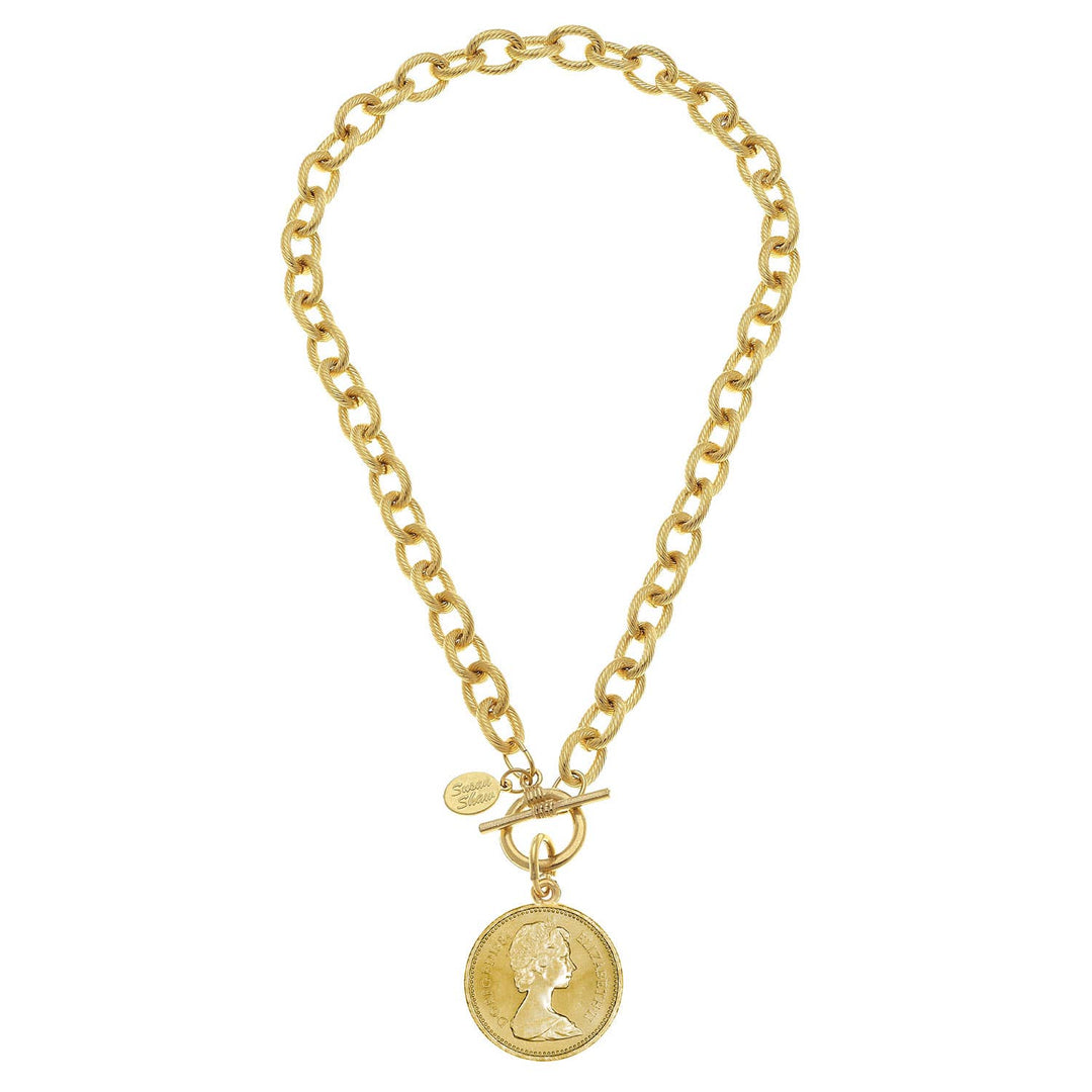 24k gold-plated Queen Coin Toggle Necklace with large oval links, coin pendant, toggle clasp, and a small tag. Sizes available.