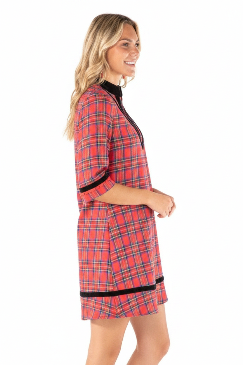 Red plaid mini dress with velvet collar, placket, and hem trim. Available in multiple sizes.
