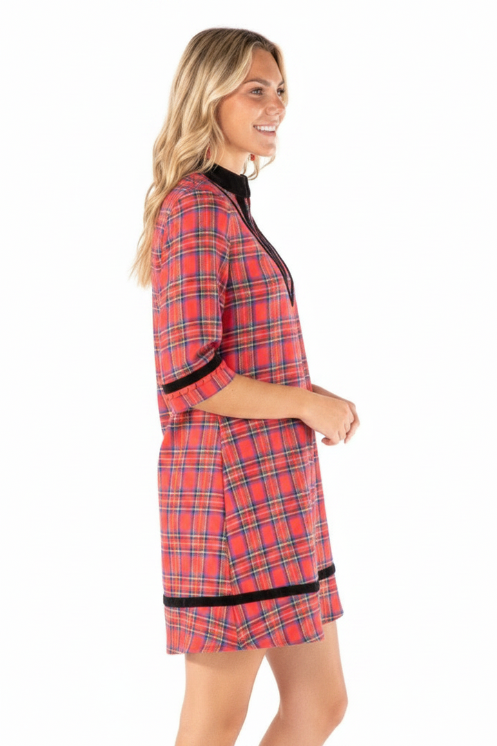 Red plaid mini dress with velvet collar, placket, and hem trim. Available in multiple sizes.