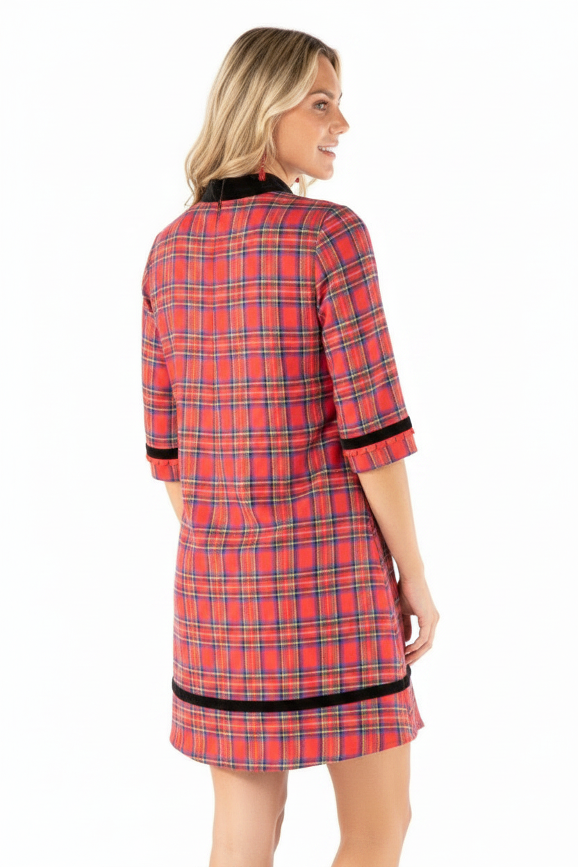 Red plaid velvet trim mini dress with black velvet collar, cuffs, and hem. Available in sizes XS-XL.