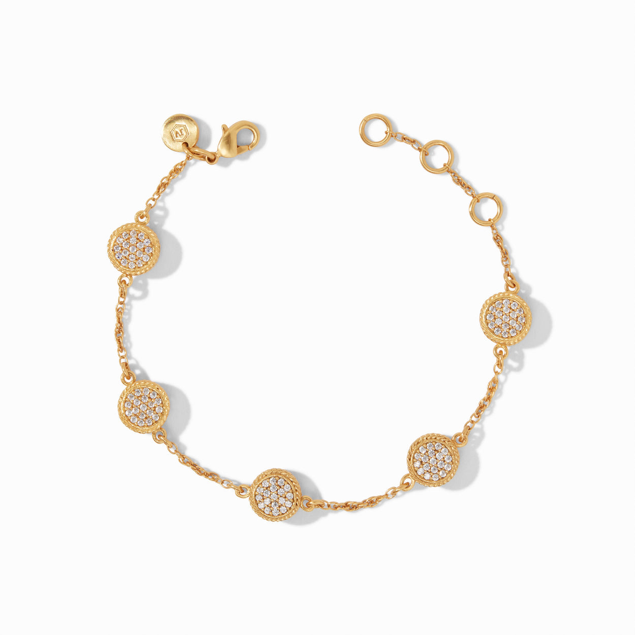 Gold bracelet with five pavé cubic zirconia stations, adjustable chain, multiple rings. Available in one size.