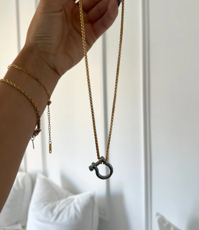 Gunmetal and gold necklace with a small lock pendant. Sizes: Small, Medium, Large.