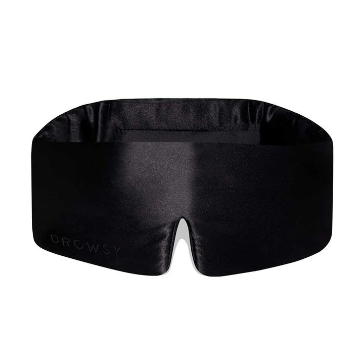 Black Drowsy Silk Sleep Mask, smooth wide design, small nose cutout, subtle logo. Total blackout. Sizes: Standard, XL.