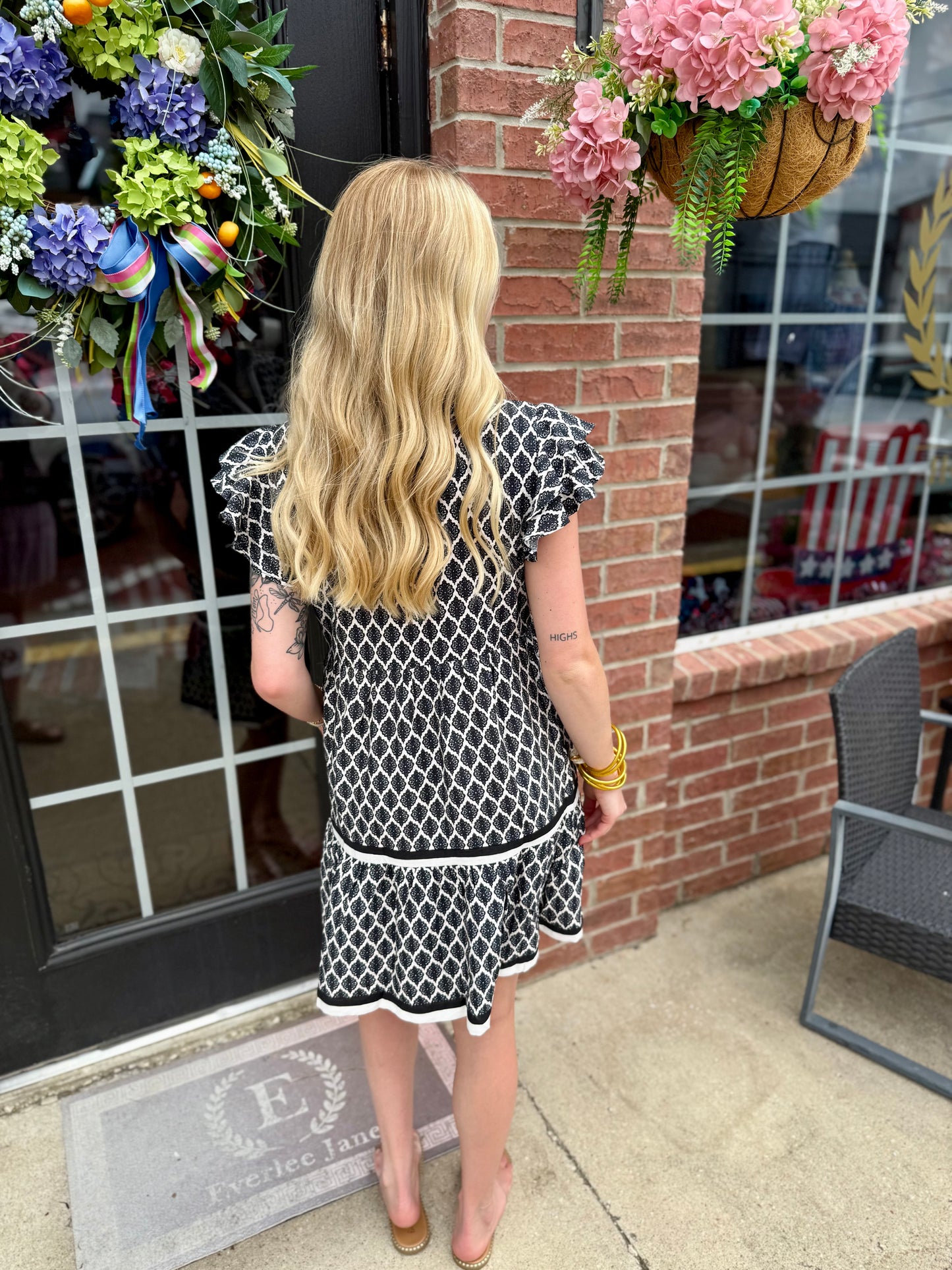 Black Ruffle Baroque Pattern Tiered Dress available in sizes XS-XL. Features ruffles, baroque print, and tiered layers.