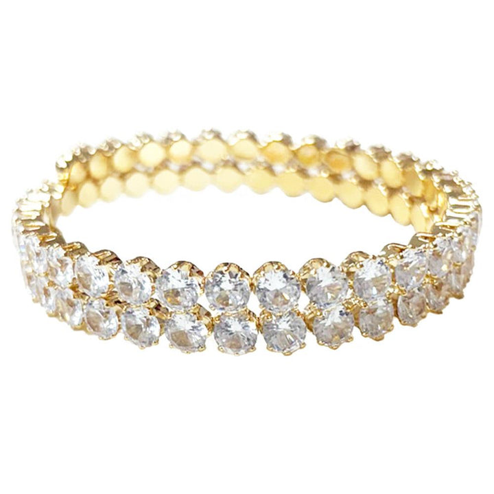 Cuff bracelet with two rows of round cubic zirconia and a textured inner band. Available in small, medium, and large sizes.