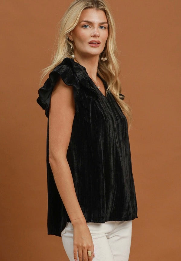 Velvet Ruffle Blouse: sleeveless black top with ruffle sleeves. Available in sizes XS–XL.