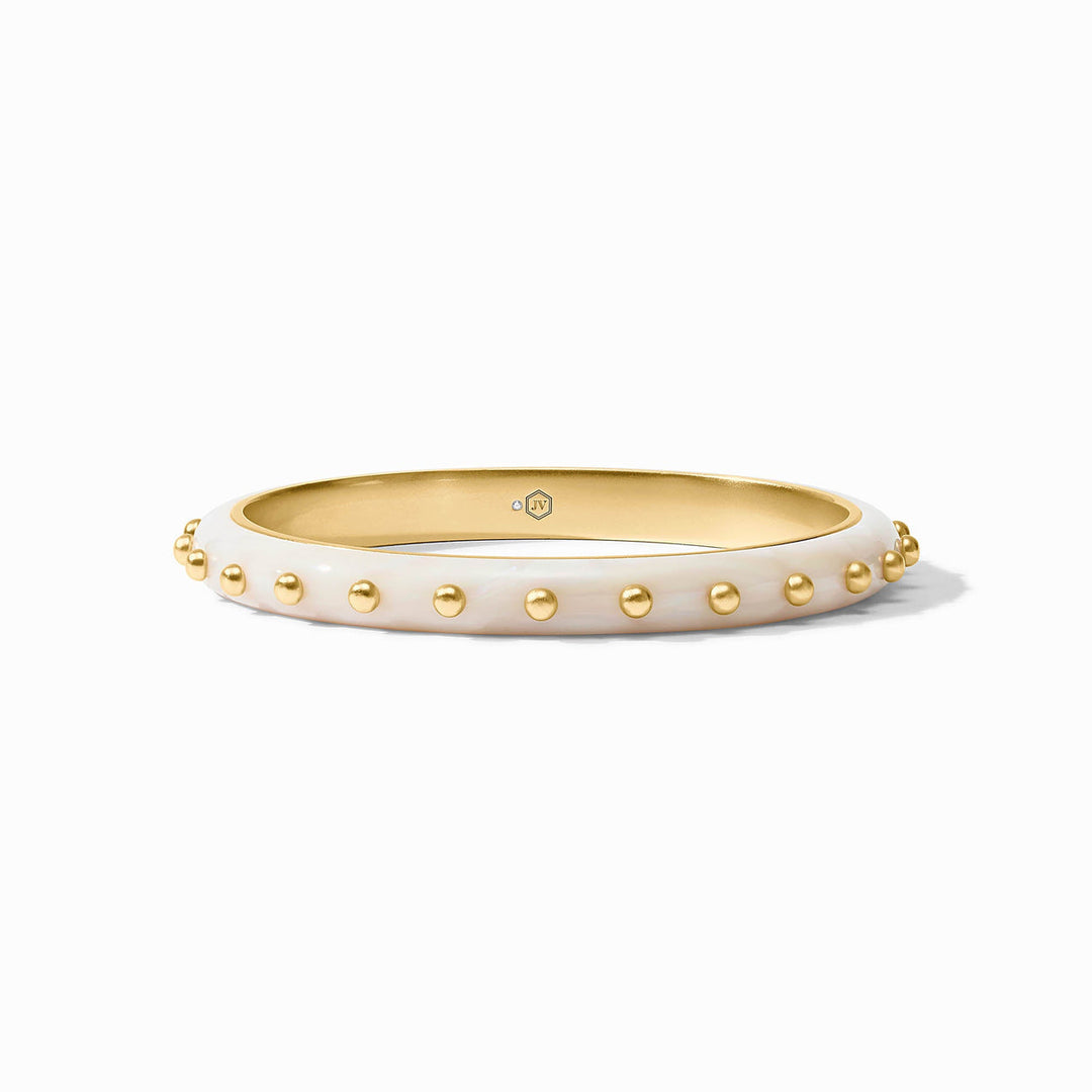 White enamel bangle with 24K gold-plated stud accents. Available in small, medium, and large sizes.