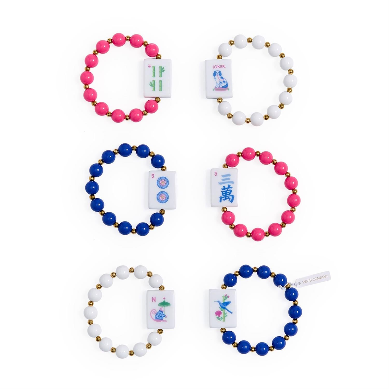 Six Mahjong Beaded Stretch Bracelets in pink, blue, and white with mahjong tile charms, colorful acrylic accents, and gold accent beads. Sizes available: one size fits most.