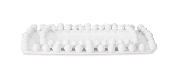 Rectangular white ceramic platter with raised edges and round beads on border. Available in small, medium, and large sizes.