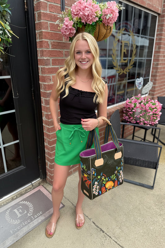 Solid Green Skort with built-in shorts. Available in XS–XL.