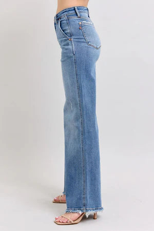 Judy Blue Retro HW Wide Fit Jeans with raw frayed hems, stretch fabric. Sizes: 24–32.