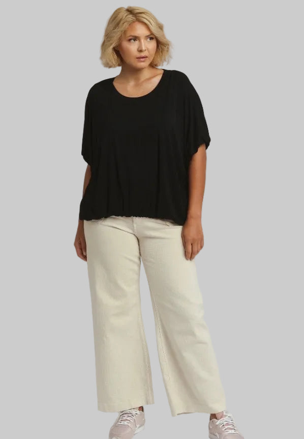 Loose black Bubble Sleeve & Hem Top, available in sizes XS–XL.