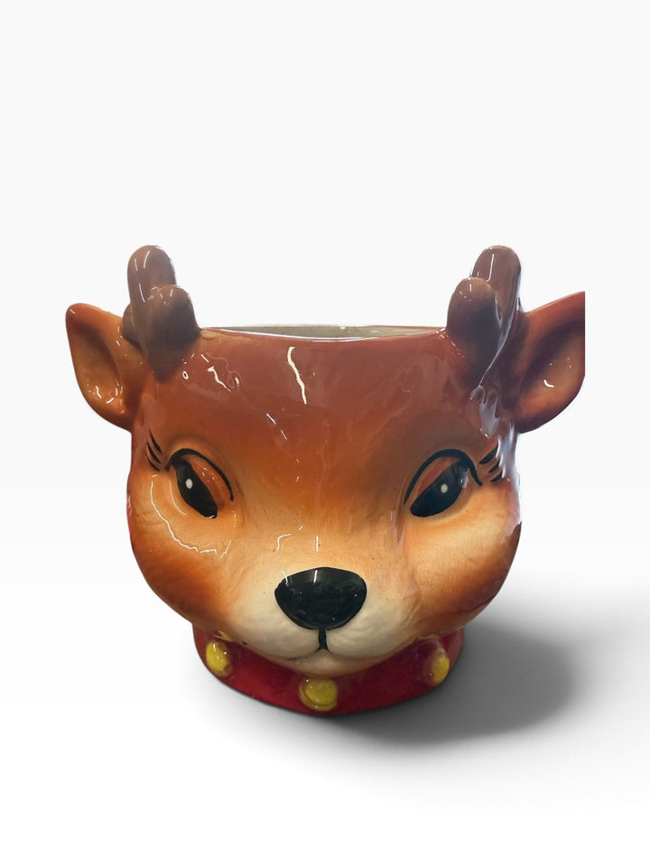 Reindeer-shaped bowl with antlers and red collar.