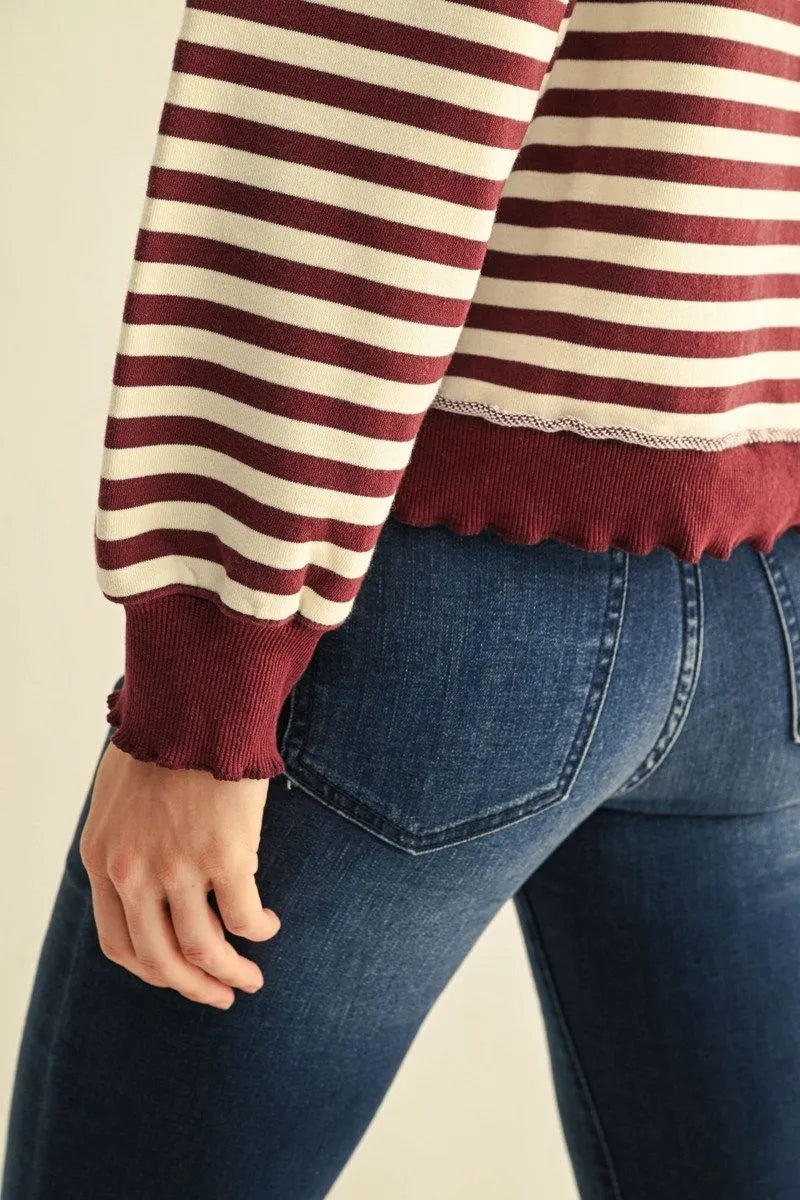Burgundy Striped Sweatshirt with ruffled edges, available in sizes XS-XL.
