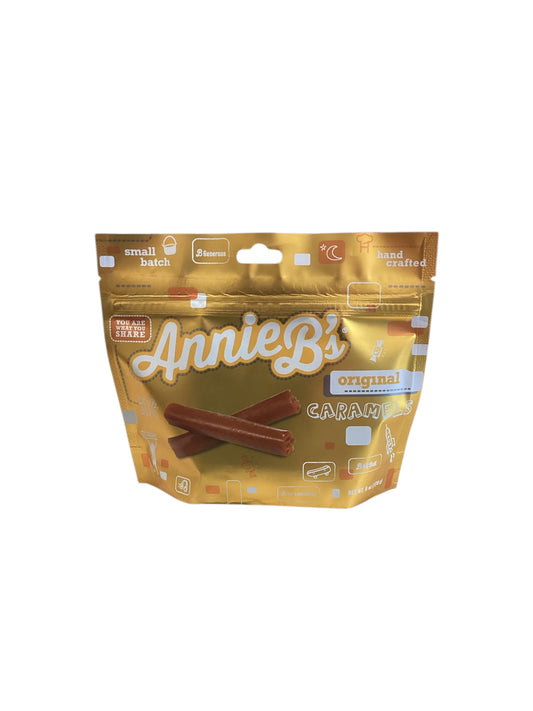 Gold pouch labeled "Caramels." Two caramels shown on front. Available sizes: Small, Medium, Large.