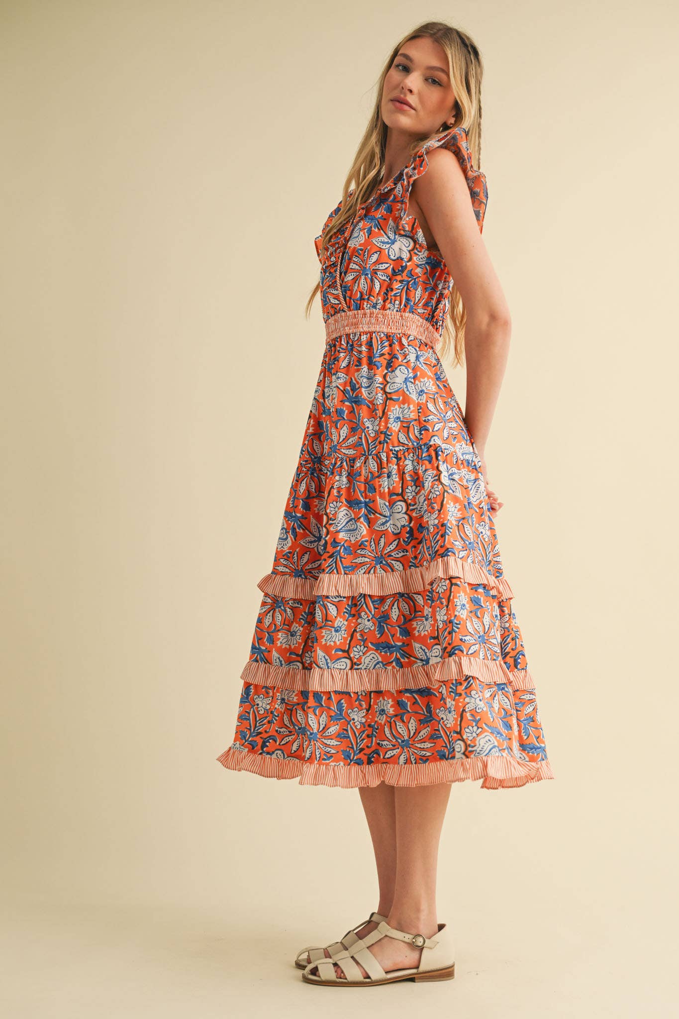Mixed Floral Print Ruffle Trim Midi Dress with orange, blue, and white floral patterns and tiered ruffles. Sizes: XS-XL.