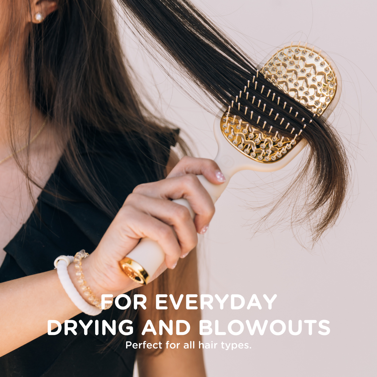 Vented Hair Brush | Tan shown in use. Text: “For everyday drying and blowouts. Perfect for all hair types.” Available in standard and travel sizes.